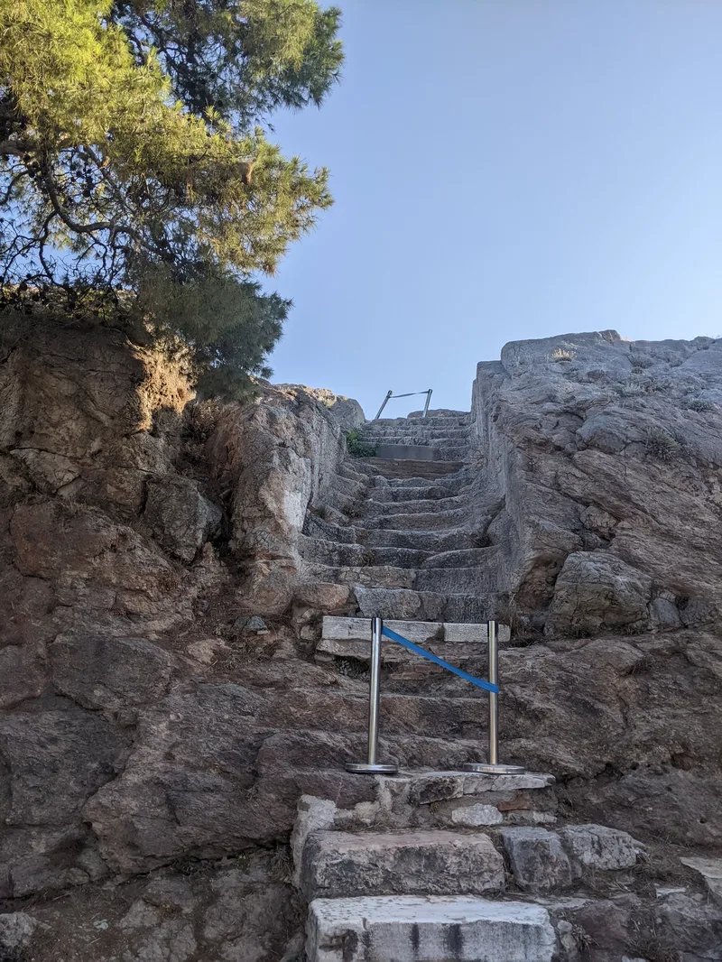 Ancient stone steps climbing steeply to the Acropolis, Athens
