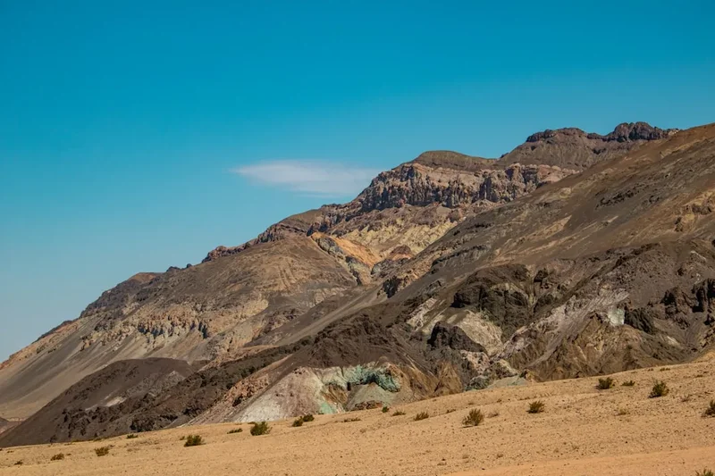 A mountain range in the middle of a desert