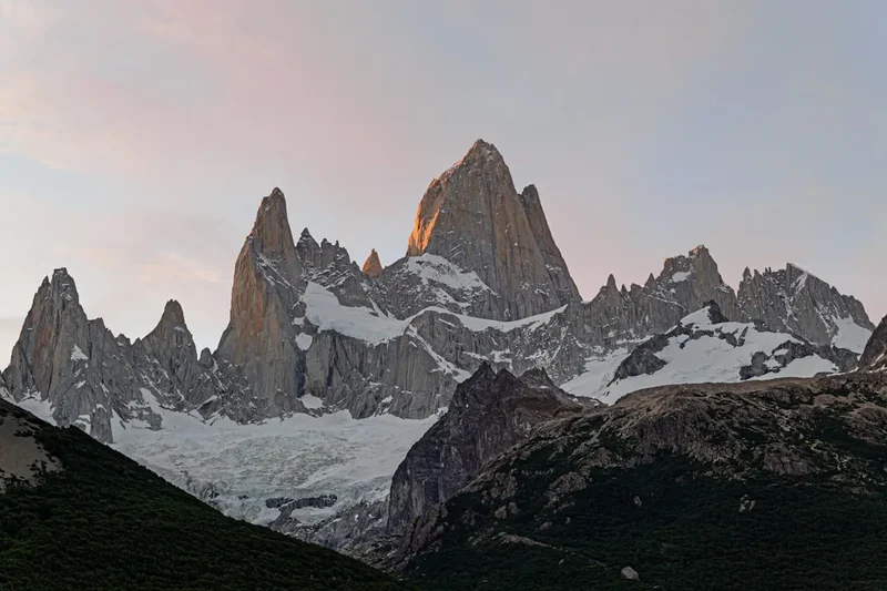 A group of mountains with snow on them