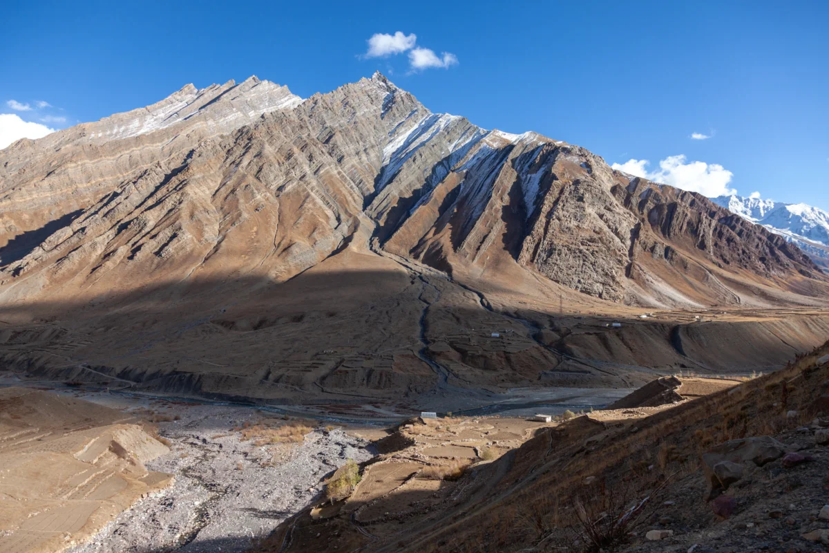 A view of a mountain range with a river running through it