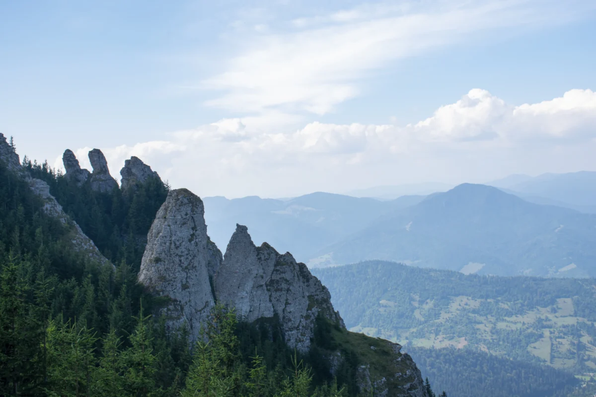 a view of a mountain range from a rooftop