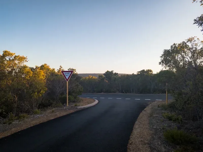 a street sign on the side of a road