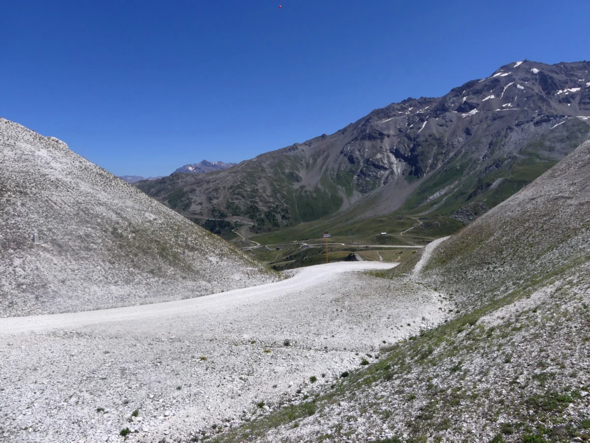 a scenic view of mountains and a road