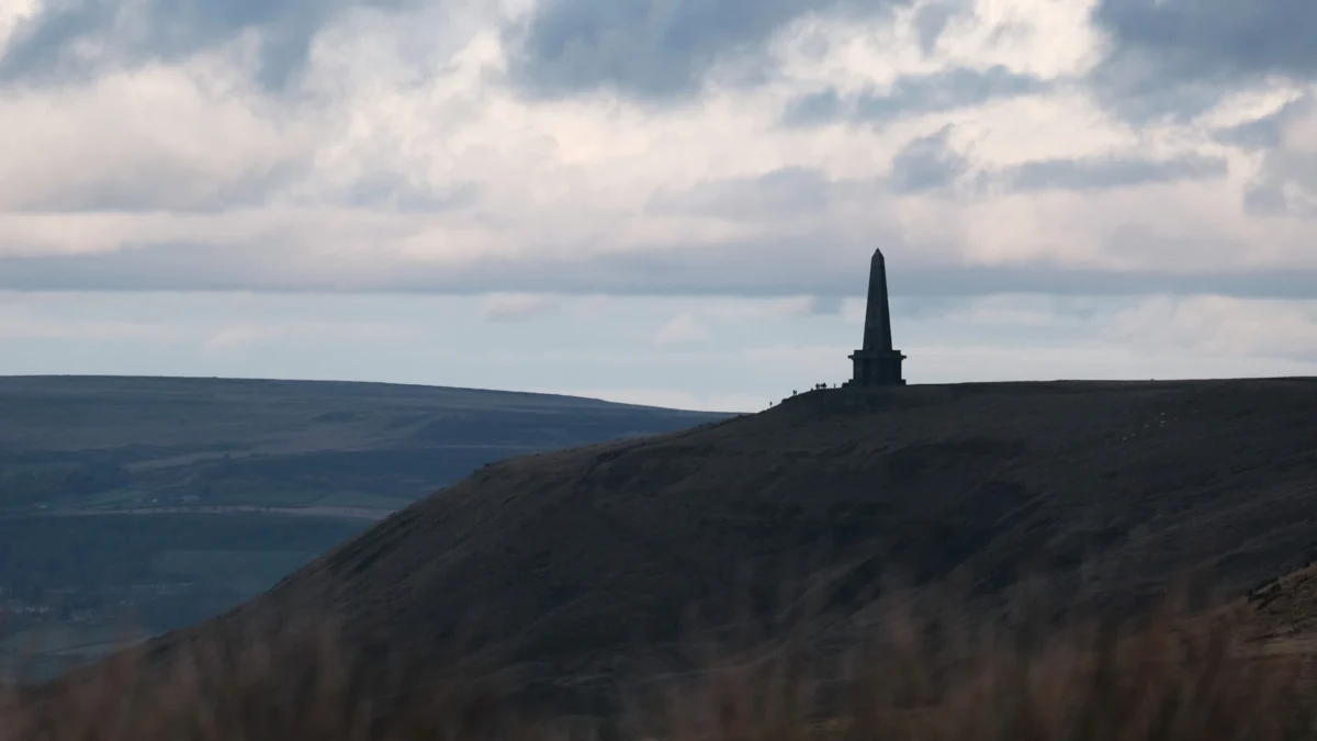a hill with a tower on top of it