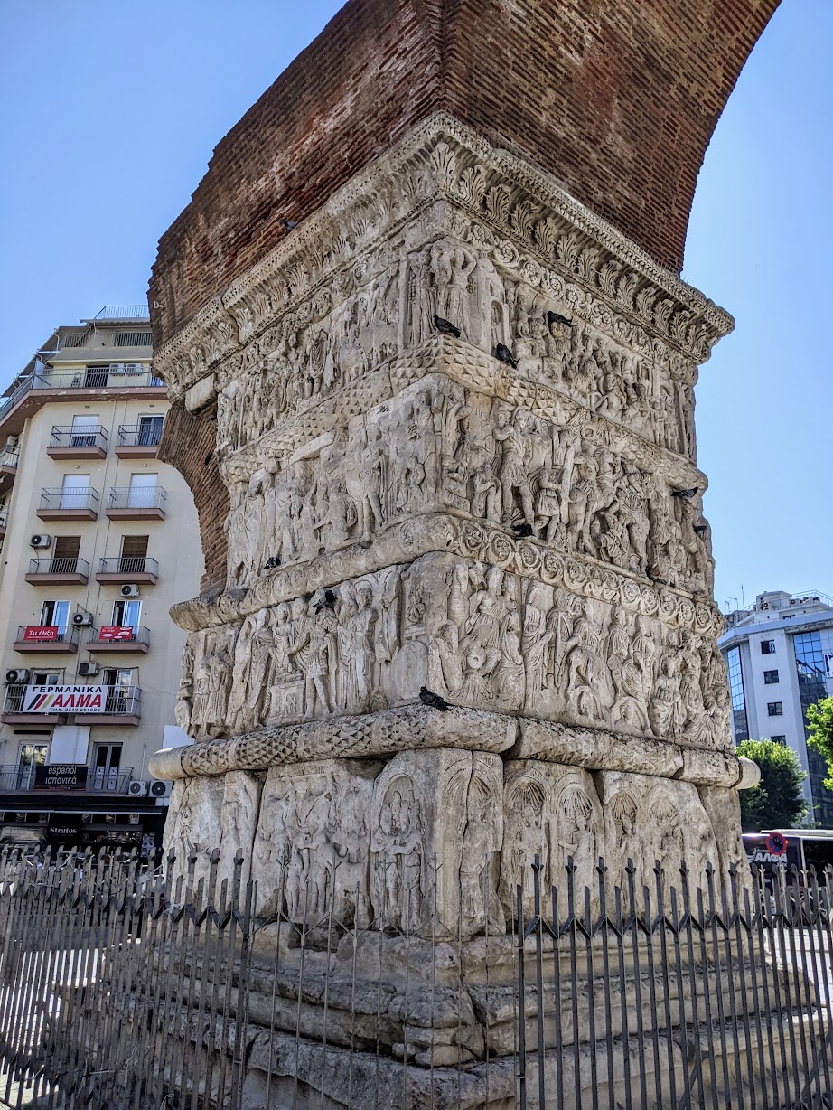 Close-up of the carved marble relief panels at the base of the Arch of Galerius, Thessaloniki