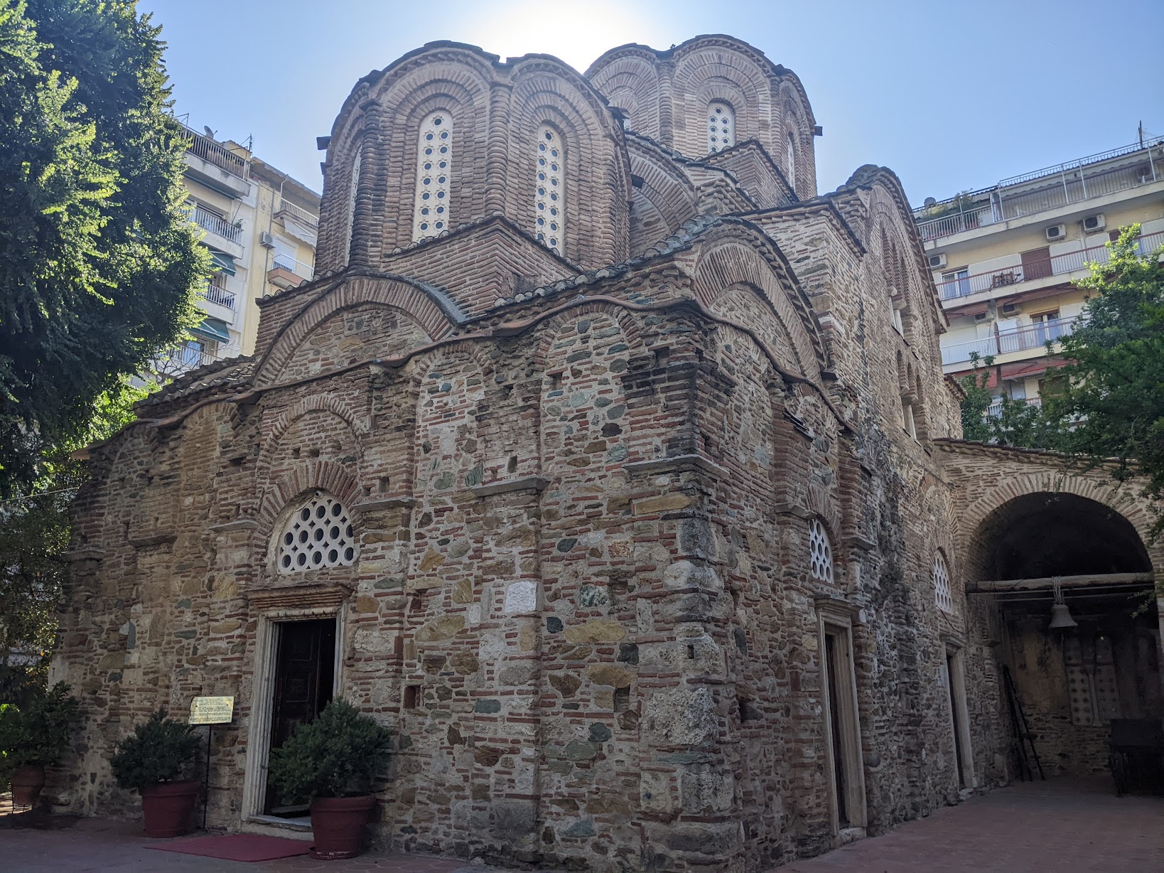The Byzantine Church of Saint Panteleimon, Thessaloniki, a UNESCO World Heritage site with brick-and-stone walls and tiled domes