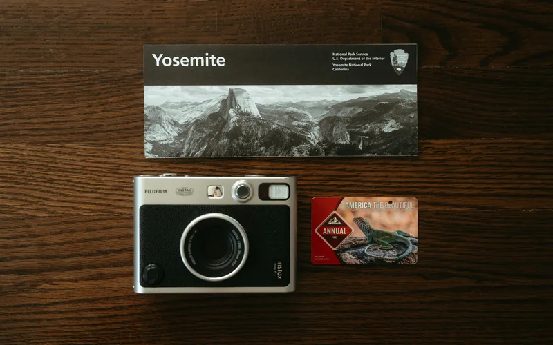 Power banks, headlamps and cameras laid out for a multi-day hike